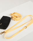 yellow waterproof dog leash, poop bag