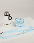 blue waterproof harness, dog lead and waterbottle