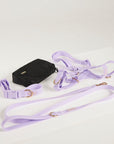 lilac dog collar, dog harness, dog leash and poop bag