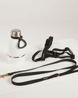 black waterproof harness, dog lead and waterbottle