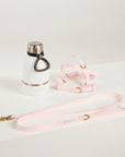 pink waterproof harness, dog lead and waterbottle