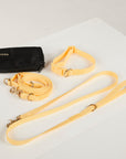 yellow dog collar, dog lead and dog poop bag pouch 