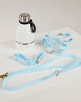 blue dog lead, harness, collar and bottle