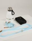 blue dog lead, hands free lead, poop bag, bottle 