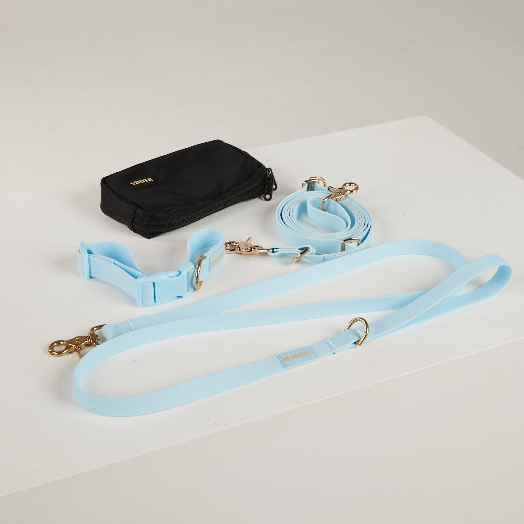 blue   dog collar, dog lead and dog poop bag pouch