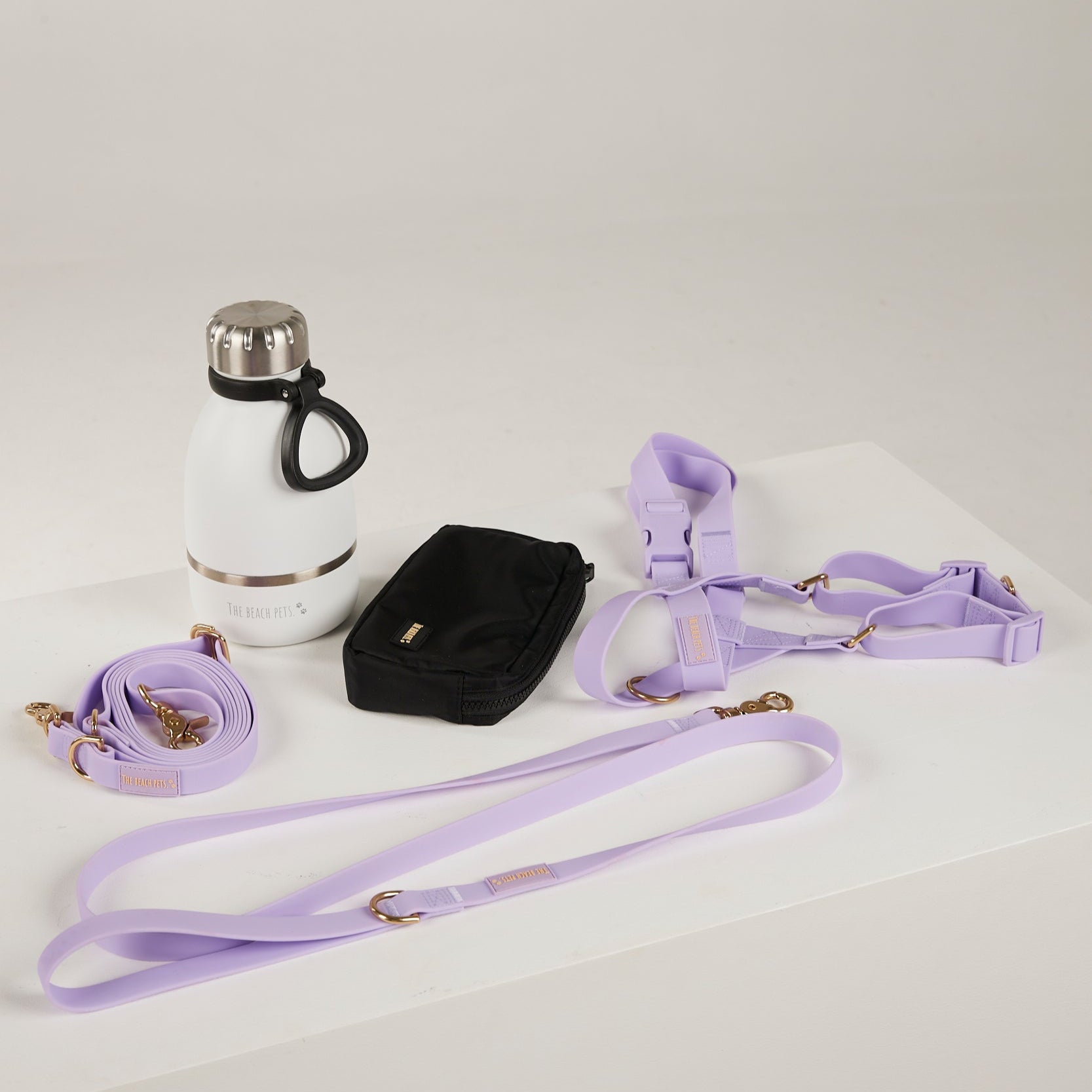 lilac dog lead, dog water bottle, dog harness, dog poo bag pouch  