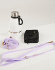 purple dog lead, hands free lead, poop bag, bottle 