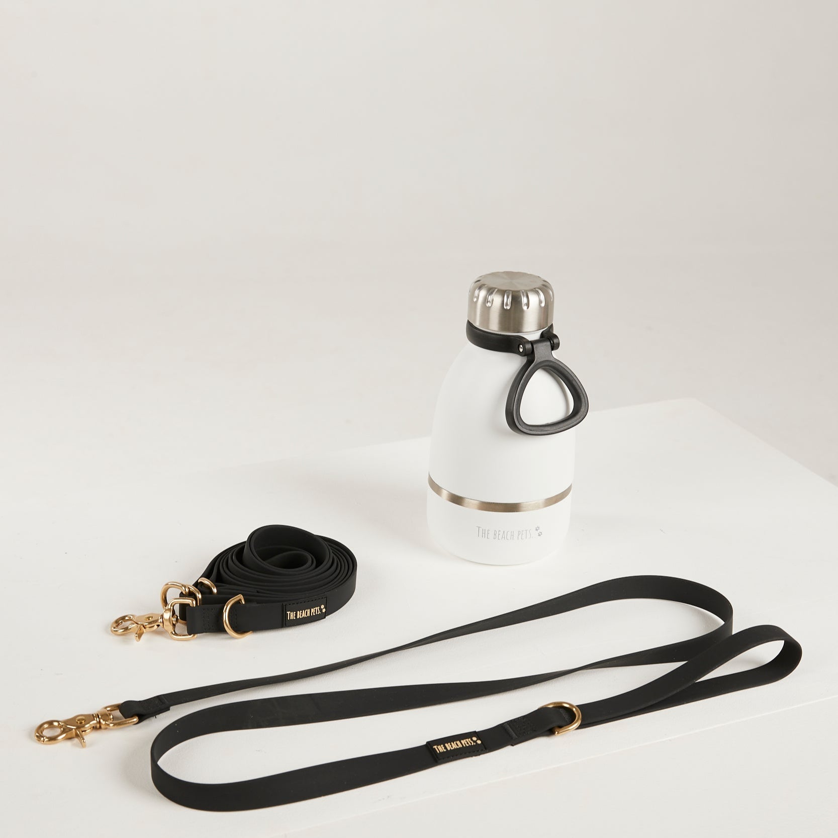 black  waterproof leads, water bottle with detachable dog bowl