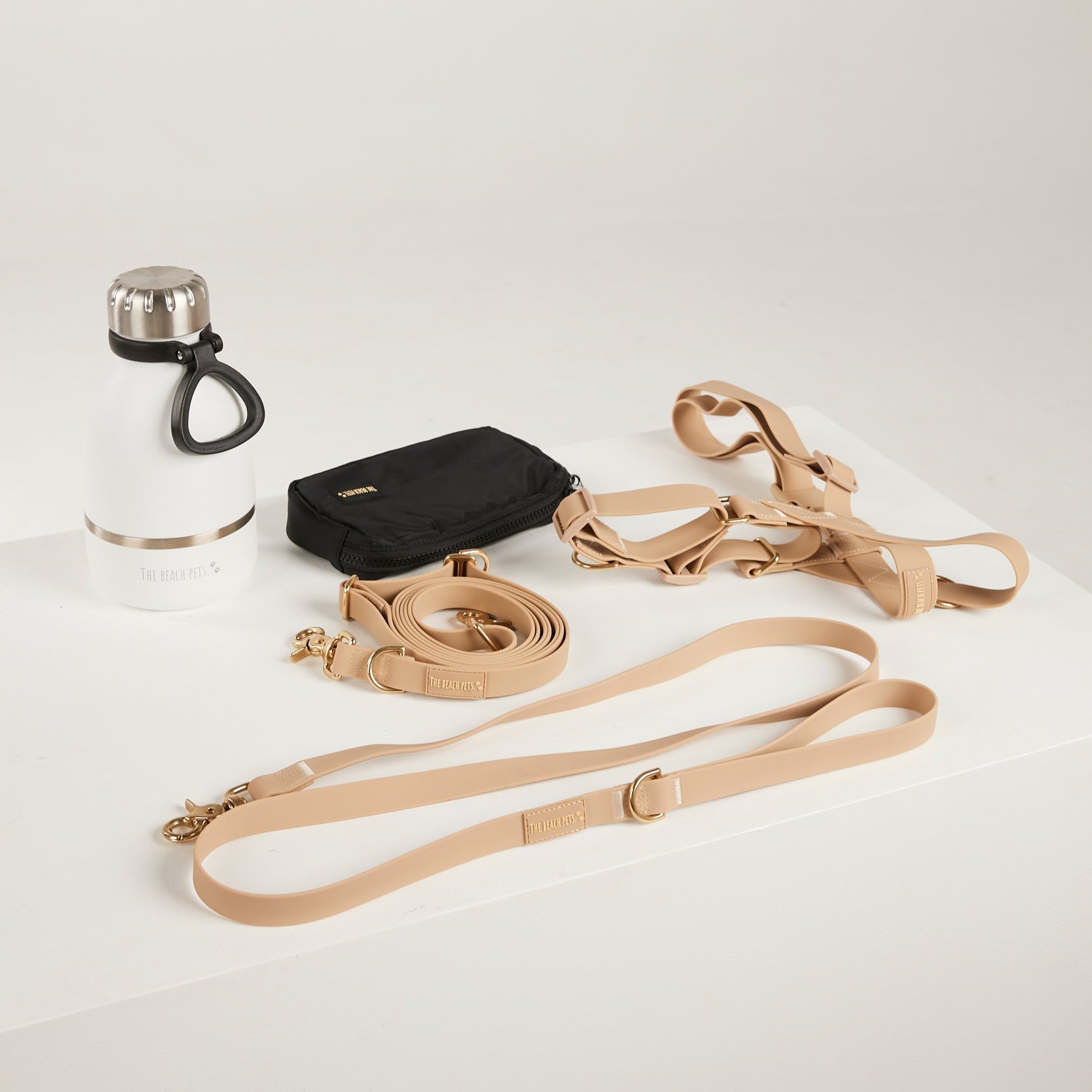 sand dog lead, dog water bottle, dog harness, dog poo bag pouch 