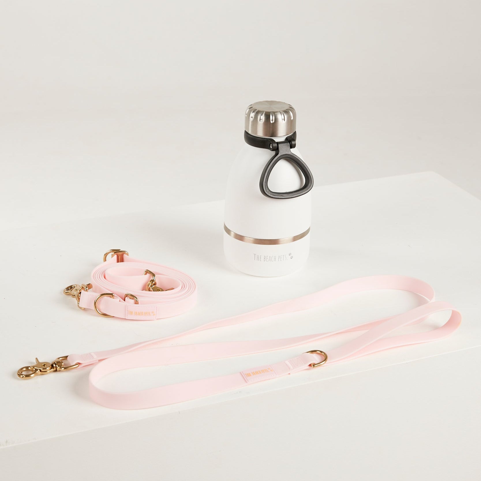pink  waterproof leads, water bottle with detachable dog bowl