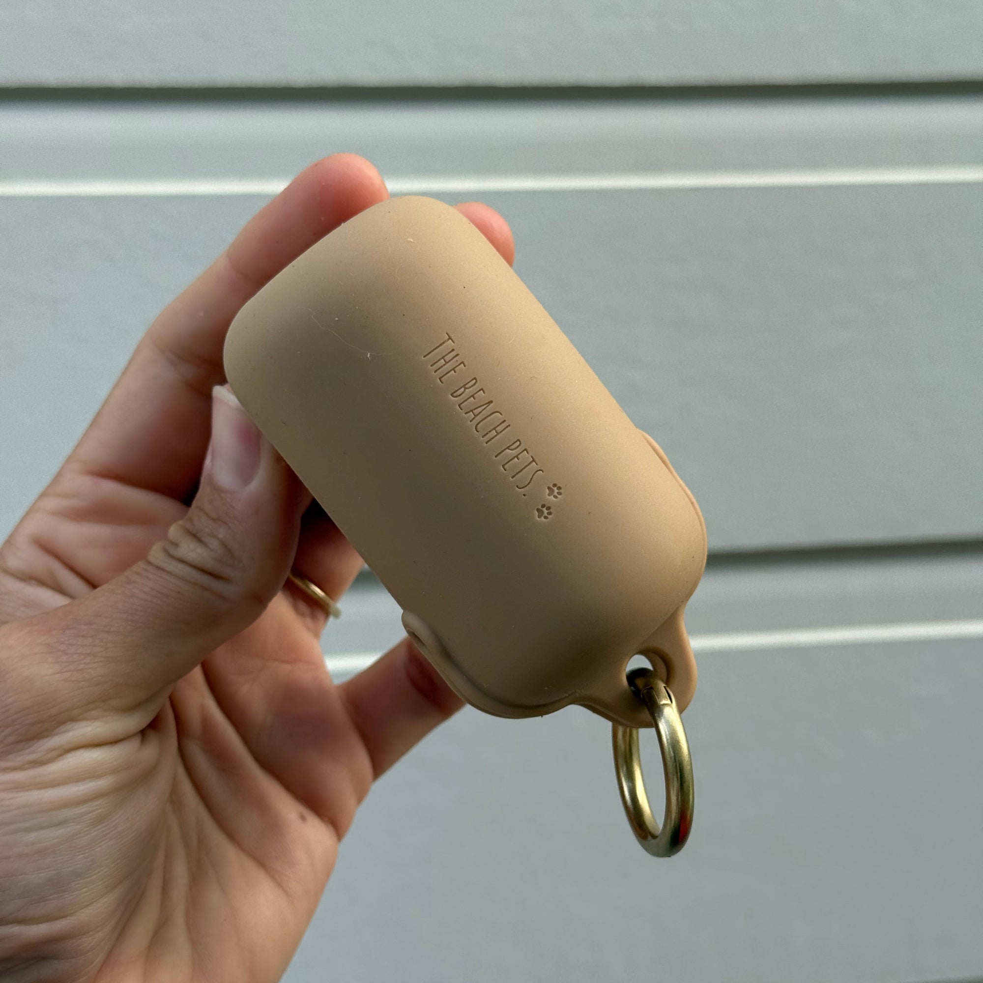 beige waterproof poop bag holders